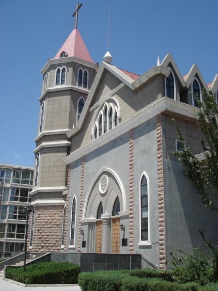 A seminary by the river, in relative isolation, framed by roads and dust. 