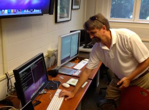 Haverford CIO Joe Spadaro presses the enter key to shut down the Trico Blackboard server for good.