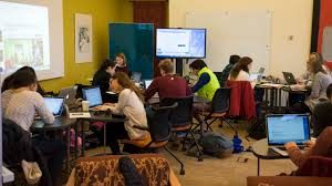 Students in classroom working in groups