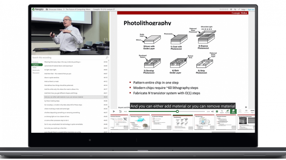 video of a lecture capture where a professor is in the corner of the video teaching in a classroom and his powerpoint slides are on the right of the video