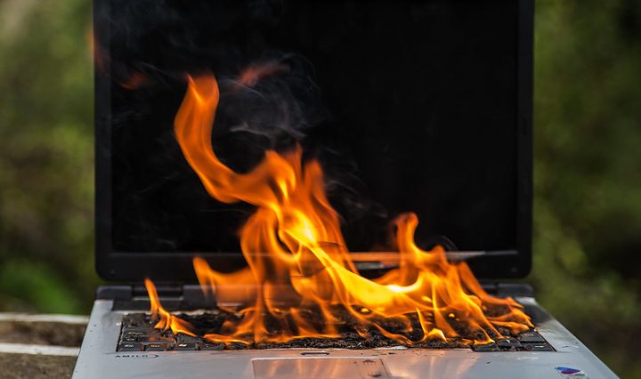 photo of a computer on fire