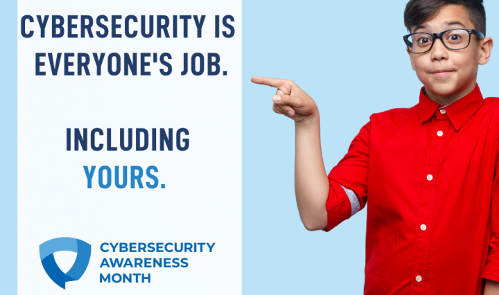 A person pointing at a sign that reads "Cybersecurity is everyone's job. Including yours."