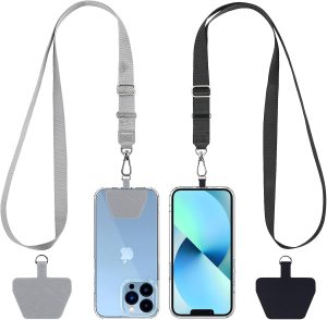 Two cellphones with lanyards hanging from them.