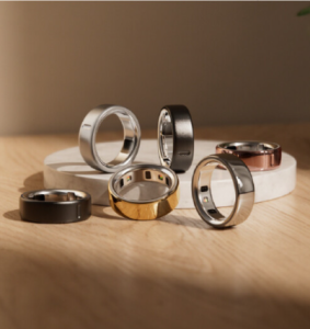 6 Oura rings standing and laying on a display