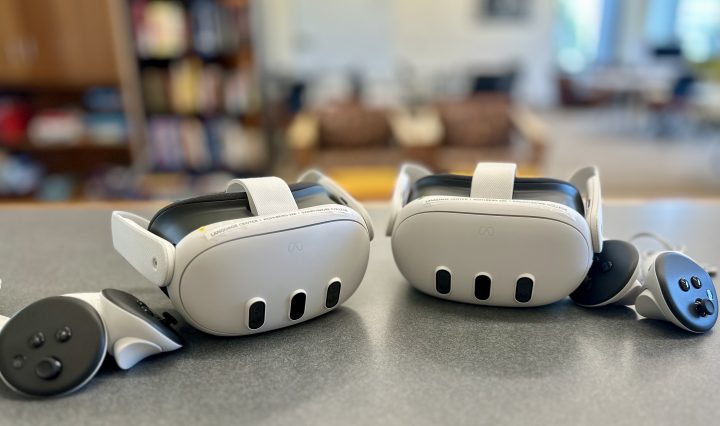 2 Meta Quest 3 headsets and 2 handsets sitting on a table in the Language Center
